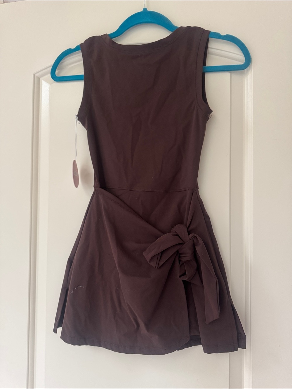 Brown Sleeveless Tie-Waist Mini Athletic Dress with built in shorts.